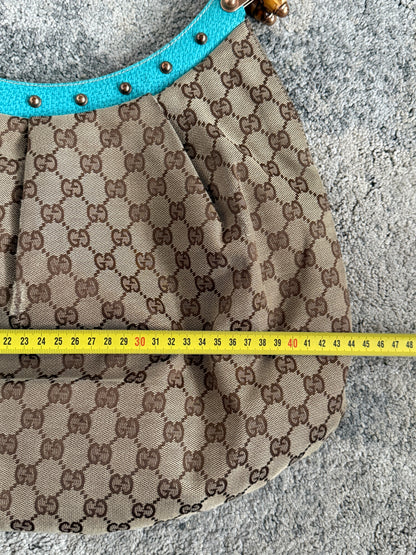 Gucci 2000’s monogram with bamboo handle